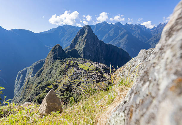 Rear view of a mature man looking at view on Machu Picchu, in Peru