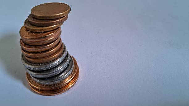 istock Brazilian real coins on white background 2228543795