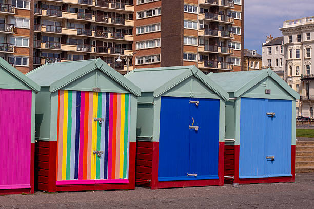 istock Hove - beach huts by the sea 2228544657