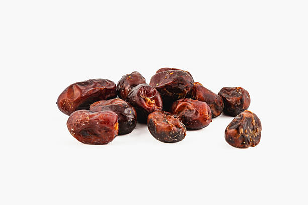 istock Dried fruits arranged on a plain background for display 2228545180