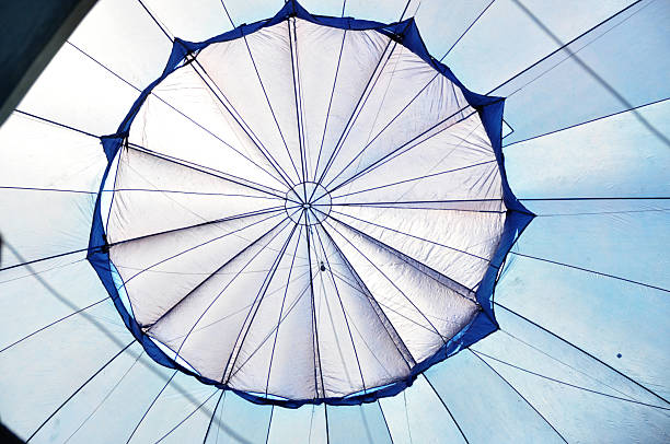istock Inside view of blue hot air balloon envelope during inflation 2228552058