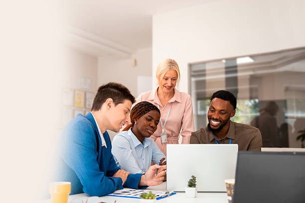 istock Multiracial colleagues collaborate in a business meeting 2228552552