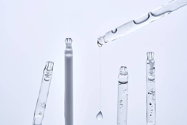 istock Five different droppers with facial serum in a row. 2228554026