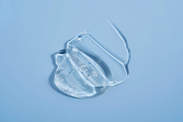 istock The texture of a cosmetic gel on a blue background. 2228554832