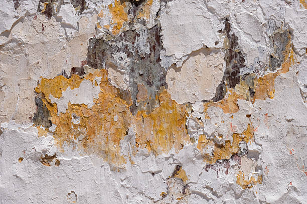istock Flaked and worn plaster exterior wall 2228555209