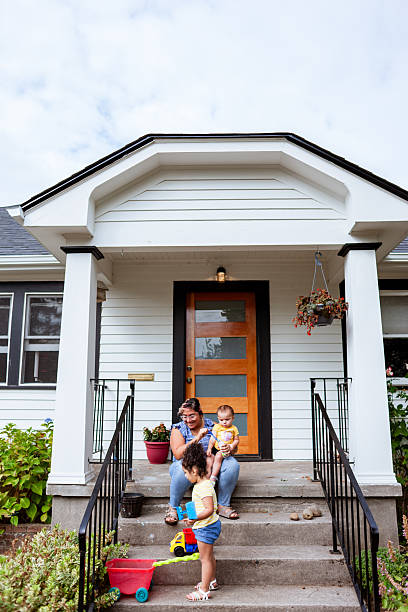 istock Family fun time relaxing on the front porch 2228557738