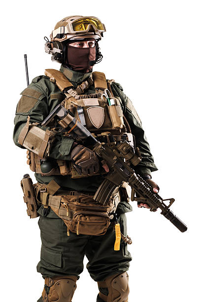 istock Equipped Soldier in Tactical Gear Holding Rifle for Combat Preparation 2228558367
