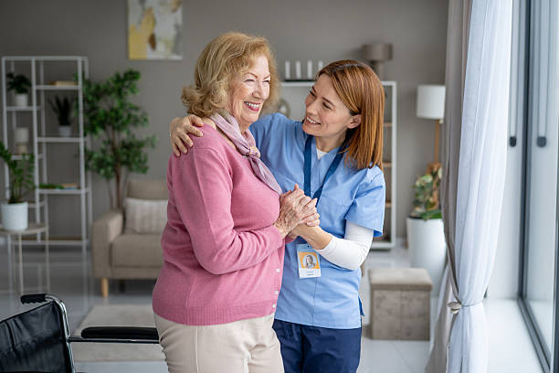 istock Radiant Care: Elderly Woman with a Caring Nurse 2228558864
