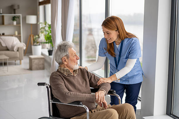 istock Engaging Interaction Between Caregiver and Senior Man 2228558881