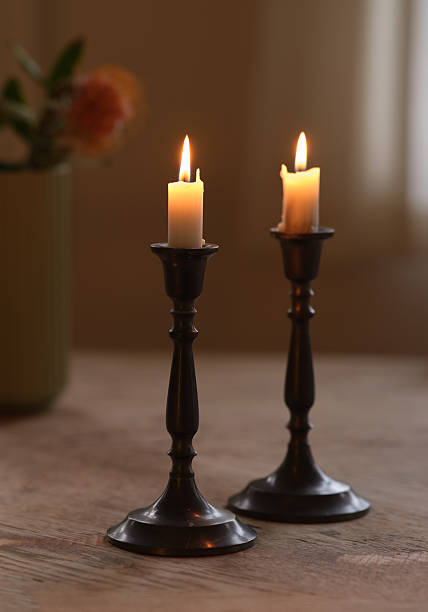 Big outdoor Hanukkah menorah in the dark with lit candles in Lviv, Ukraine
