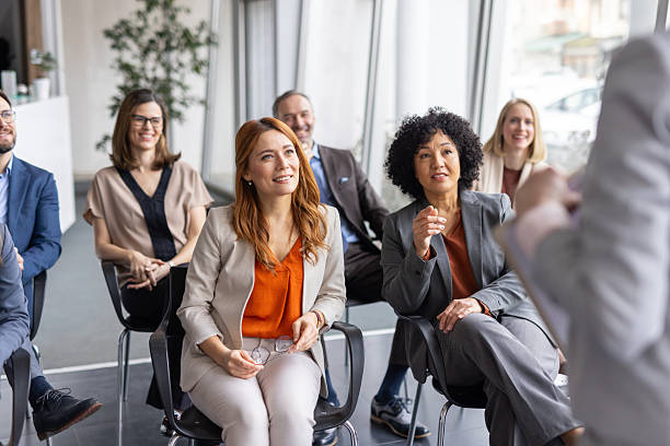 istock Professional group meeting with engaged audience in office 2228560588