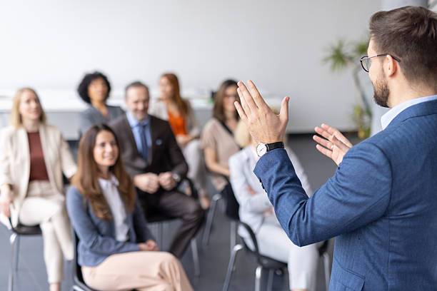 istock Speaker Sharing Insights with Focused Group of Attendees 2228560599