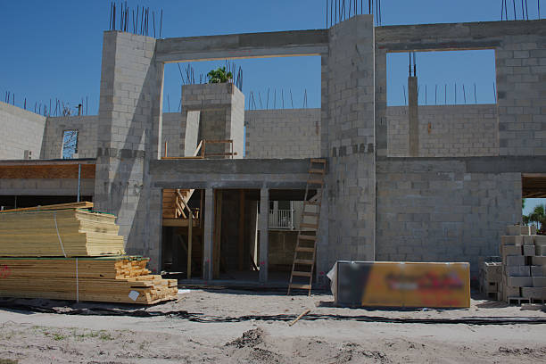 istock Residential two story Building Under Construction With Materials and Tools Onsite 2228561973