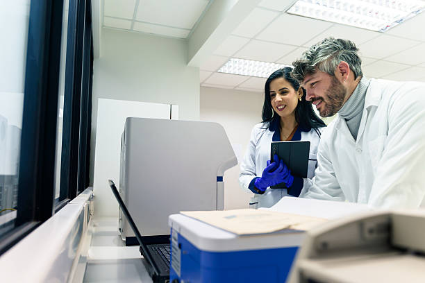 istock Latin american scientists analyzing medical data on tablet in laboratory 2228562041