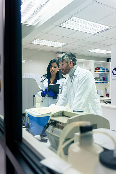 istock Latin american scientists analyzing medical data in laboratory 2228562044