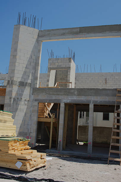 istock Residential two story Building Under Construction With Materials and Tools Onsite 2228562115