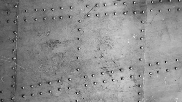 istock Abstract background of metal wall with rivets. 2228562902
