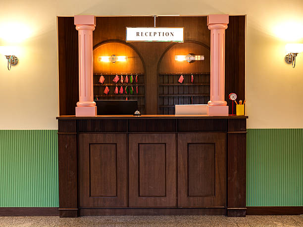 istock Retro Hotel Reception Counter with Warm Ambient Lighting 2228564339