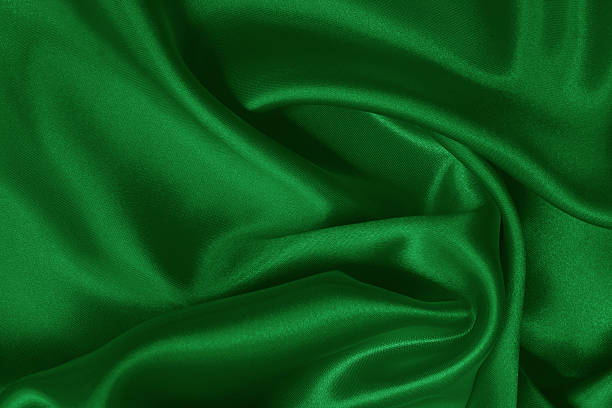 istock Green emerald fabric texture background, detail of silk or linen pattern. 2228577122