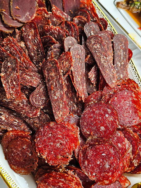 Sliced raw smoked sausage