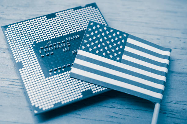 istock America flag on CPU computer (central processing unit) wooden background. 2228581330