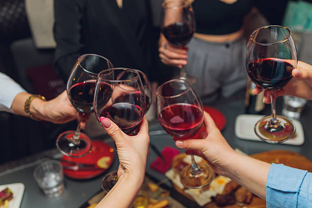 istock Clinking glasses with alcohol and toasting, party. 2228581779