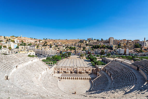 The Aspendos Theatre in Turkey is a remarkably well-preserved Roman-era theater, known for its excellent condition and architectural integrity. Built in 155 AD under Emperor Marcus Aurelius, it features a horseshoe-shaped seating area carved into a hillside, a magnificent stage building, and once seated approximately 13,000 spectators, with modern events accommodating over 20,000. It is considered one of the most intact and distinguished examples of Roman theater architecture in the world.
