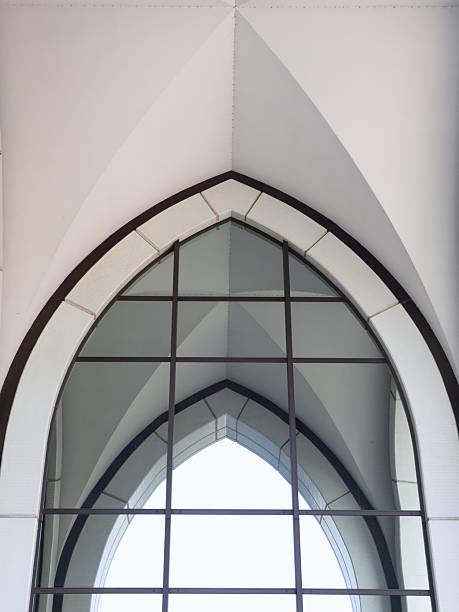istock White arch with a glass walls with lines shadows and reflections. 2228588201