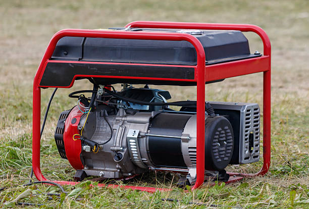 istock A red and black portable generator sits on the grass 2228588651
