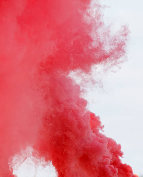 istock A red cloud of smoke is billowing into the sky 2228588677