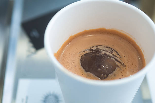 istock Cold chocolate made from cocoa nips, milled into chocolate bars and placed in a white paper cup. 2228589464
