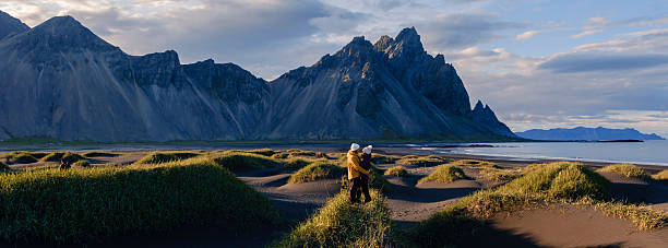 istock Serene stroll along Stokksnes beach with Vestrahorn mountain backdrop in Iceland 2228590194