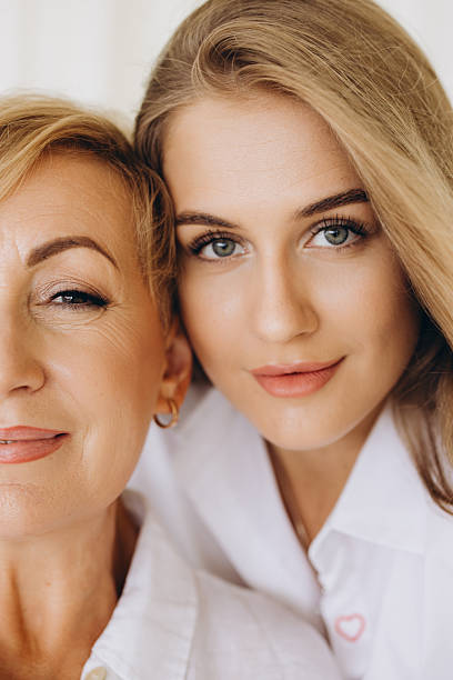 istock Mother and Daughter Sharing a Tender Moment of Affection 2228590302