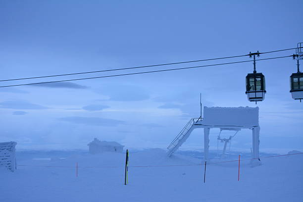 istock Snowy Mountain Gondola Station at Dusk. 2228594479