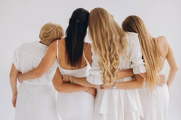 istock Four generations of women embracing each other 2228595752