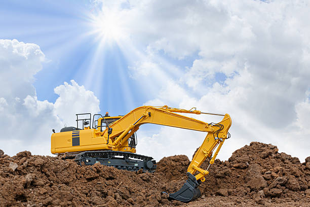 istock Excavator with Bucket lift up are digging  soil . 2228599341