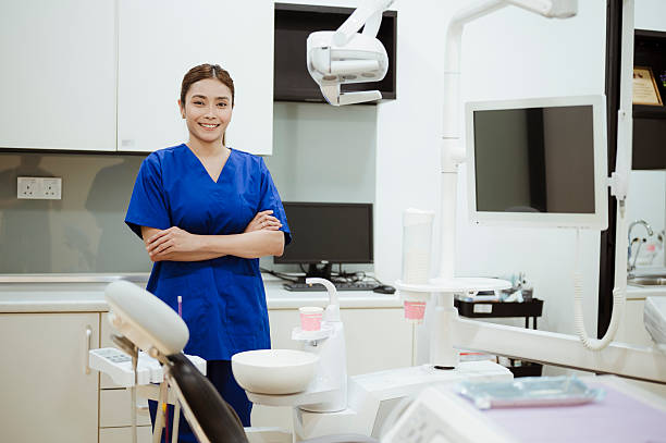 istock Confident Dentist in Modern Clinic with Digital Radiography Equipment 2228601083