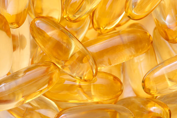 istock Pile of Gel Capsules in Container 2228601450