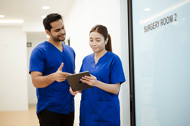 istock Dental Team Working Together in Contemporary Office 2228601580