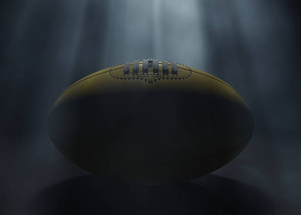 istock Aussie Rules Sports Ball Ethereal Spotlight 2228601629