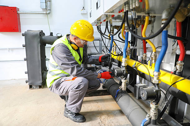 istock Technician Repairing Industrial Gas Pipeline System 2228601694