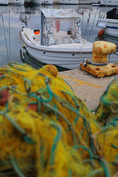 istock Fishing boat at harbor 2228602534