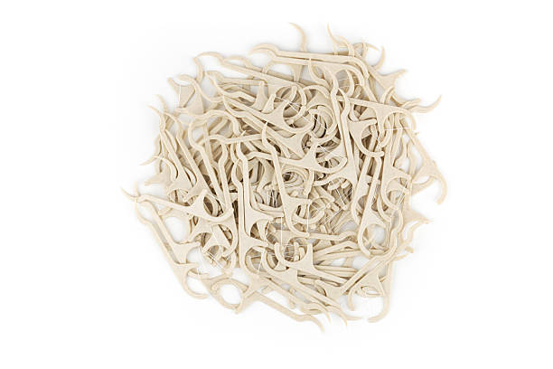 istock Eco friendly corn starch dental toothpick with dental floss on white background 2228605237