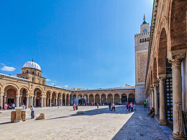 The Al-Zaytuna Mosque in Tunis, built in the 8th century, is a historic center of Islamic scholarship and architecture, known for its iconic minaret and rich cultural heritage.