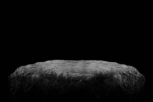 istock Stone podium on dark black background. 2228607220