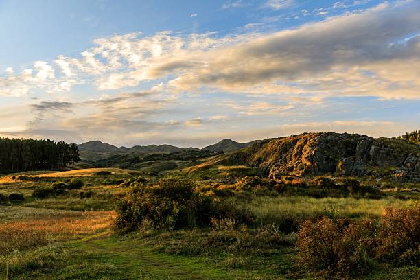istock Scenic landscape with rolling hills and sunset sky. 2228607234