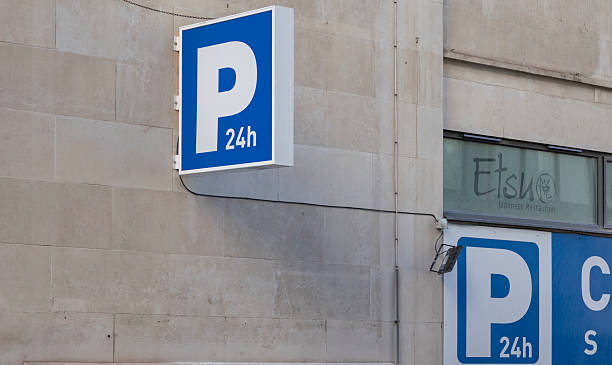 istock blue and white sign, city centre parking 2228612019