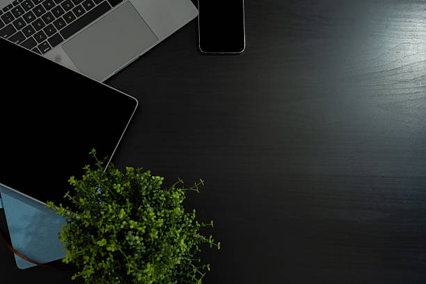 office desk with computer and supplies. Table Top view with space for your text.