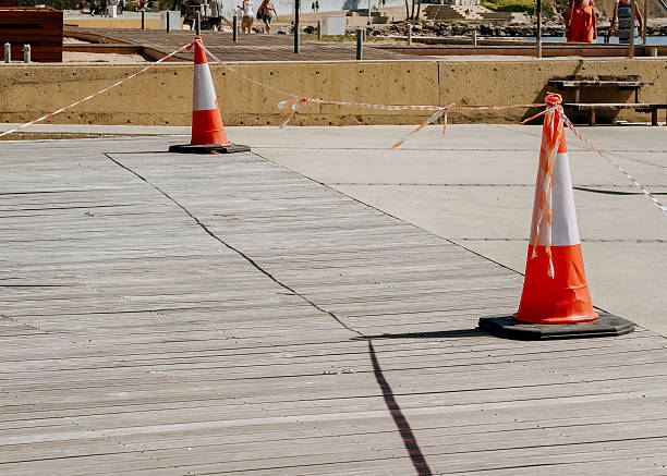 istock Urban security bollards on a sunny day casting long shadows on modern pavement 2228619206