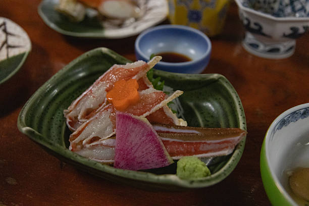 istock Artfully Plated Japanese Crab Sashimi with Garnish 2228622321